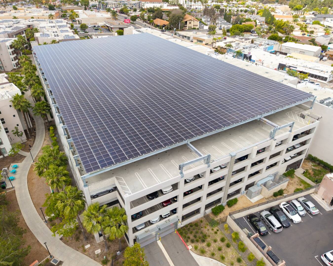 Aerial view of solar panels on a garage rooftop in San Diego